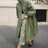 Noée | Veste oversize pour femme avec col montant, cordon de réglage et manches ballon