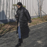 Yannette | Manteau long matelassé pour femme, avec col montant et coutures surpiquées