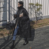 Yannette | Manteau long matelassé pour femme, avec col montant et coutures surpiquées