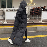 Isadora | Manteau matelassé extra long pour femme, avec capuche et rembourrage thermique coupe-vent