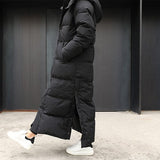 Isadora | Manteau matelassé extra long pour femme, avec capuche et rembourrage thermique coupe-vent