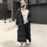 Isadora | Manteau matelassé extra long pour femme, avec capuche et rembourrage thermique coupe-vent