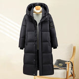 Jolande | Parka thermique matelassée extra-longue pour femme, avec capuche et poignets côtelés