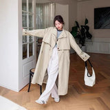 Rosalinde | Trench coat oversized pour femme, avec cape dans le dos et cordon de réglage à la taille