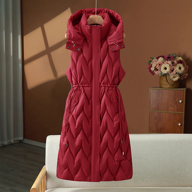 Olympe | Gilet long matelassé pour femme, avec capuche et cordon ajustable à la taille