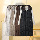 Kalinda | Gilet thermique long pour femme, matelassé, avec capuche et poches multifonctions