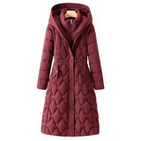 Lorraine | Manteau d'hiver long matelassé pour femme, avec capuche et silhouette cintrée