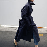 Zaza | Manteau long pour femme avec ceinture à la taille et col haut de style droit