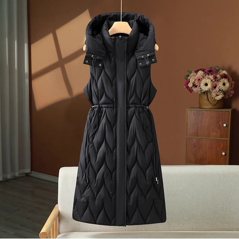 Olympe | Gilet long matelassé pour femme, avec capuche et cordon ajustable à la taille