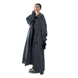 Théone | Manteau à coupe oversized pour femme, avec manches ballons et ceinture à la taille