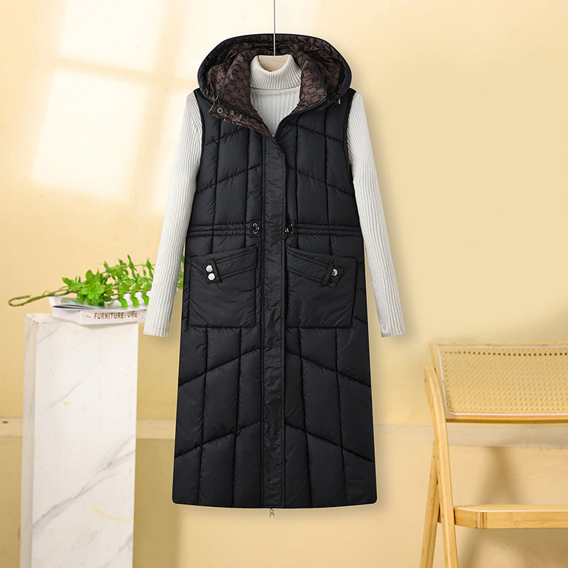 Kalinda | Gilet thermique long pour femme, matelassé, avec capuche et poches multifonctions