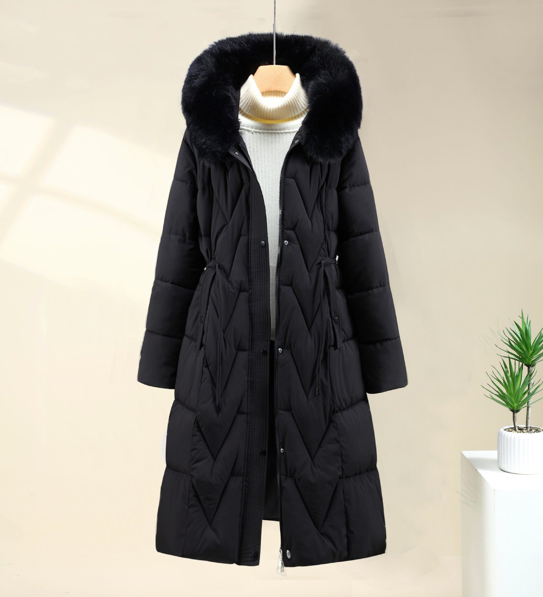 Radegonde | Parka longue matelassée pour femme avec capuche en fausse fourrure et poignets côtelés