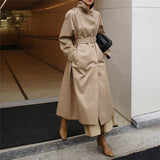 Zaza | Manteau long pour femme avec ceinture à la taille et col haut de style droit