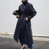 Zaza | Manteau long pour femme avec ceinture à la taille et col haut de style droit