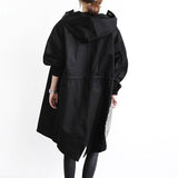 Huguette - Le trench-coat élégant imperméable